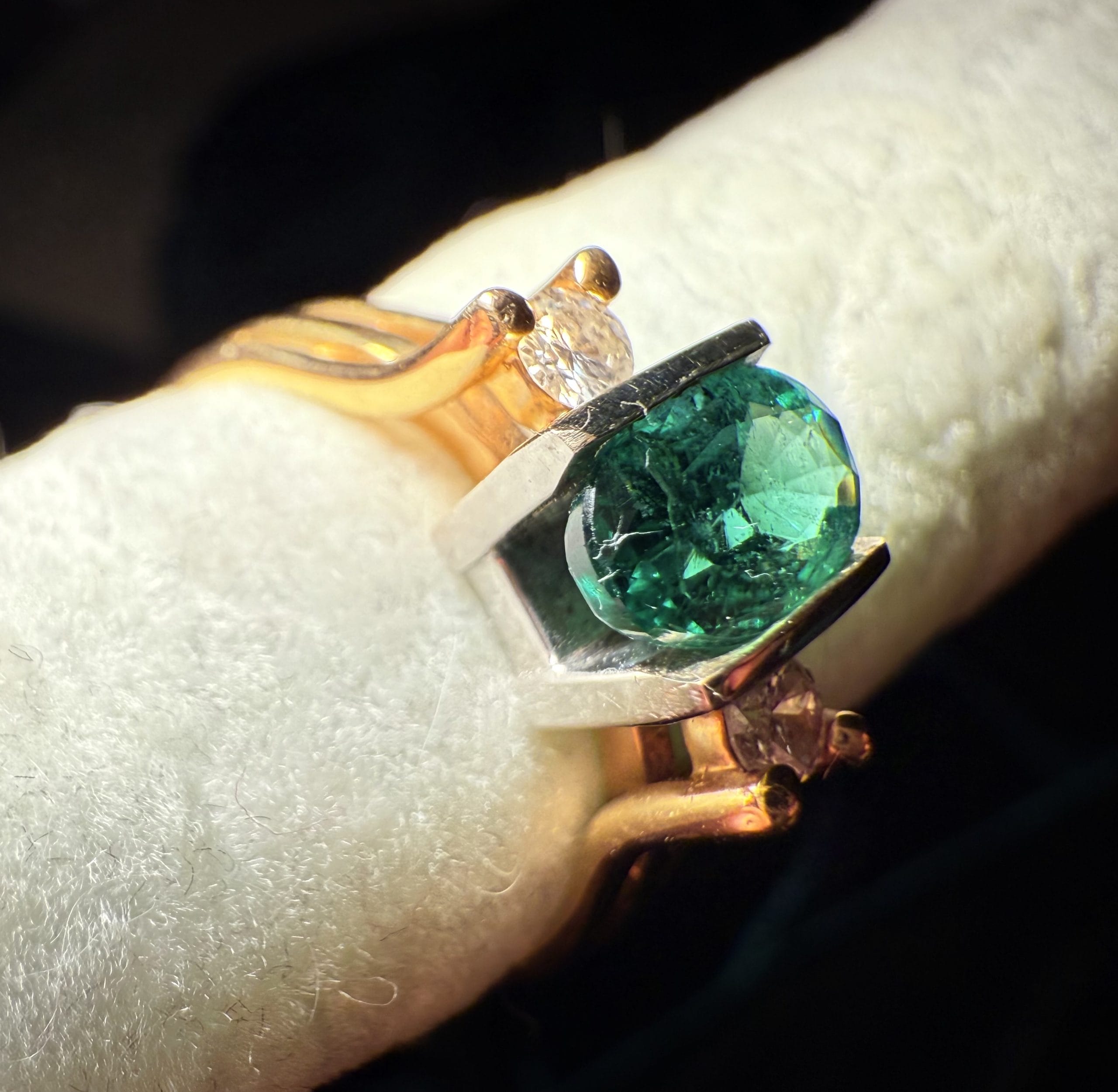 Custom gold and emerald ring by Charlotte's Fine Jewelry in Seattle, WA